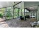 Beautiful pool on screened patio is perfect for relaxation and entertainment at 5619 Essex Ct, Palm Harbor, FL 34685