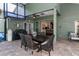 Spacious outdoor dining and living with grill and access to screened-in pool at 5619 Essex Ct, Palm Harbor, FL 34685