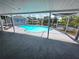 Private screened-in pool with a beautiful waterfront view, ideal for enjoying sunny days at 5817 Liverpool Dr, Tampa, FL 33615