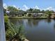 Scenic view of the canal from the property, showcasing waterfront living at its finest at 5817 Liverpool Dr, Tampa, FL 33615