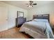 Bedroom with dark furniture and a ceiling fan at 6350 18Th N Ave, St Petersburg, FL 33710