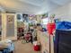 Untidy room filled with stacked boxes, furniture, and personal belongings at 6350 18Th N Ave, St Petersburg, FL 33710
