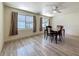 Bright dining room with a ceiling fan and two windows at 6350 18Th N Ave, St Petersburg, FL 33710