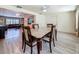 Dining room with marble table and view of the living room at 6350 18Th N Ave, St Petersburg, FL 33710