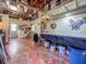 An open garage space featuring unfinished ceiling and concrete flooring at 6350 18Th N Ave, St Petersburg, FL 33710