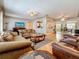 Spacious living room with hardwood floors open to the kitchen and dining area at 6350 18Th N Ave, St Petersburg, FL 33710