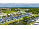 A waterfront community featuring modern homes, pools, and canal access near commercial areas at 6532 Simone Shores Cir, Apollo Beach, FL 33572