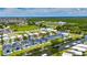 Waterfront community featuring modern homes, pools, and canal access with nearby commercial and recreational areas at 6532 Simone Shores Cir, Apollo Beach, FL 33572