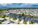 The home is shown in an aerial view with water ways and neighborhood layout at 6532 Simone Shores Cir, Apollo Beach, FL 33572