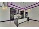 Modern kitchen with sleek black and white cabinetry, quartz countertops, stainless steel appliances, and marble flooring at 6532 Simone Shores Cir, Apollo Beach, FL 33572