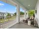 Inviting balcony offering comfortable seating and neighborhood views at 702 34Th N Ave, St Petersburg, FL 33704