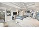 Comfortable bedroom with a walk in shower, soft carpet, neutral colors, a ceiling fan, and ample lighting at 702 34Th N Ave, St Petersburg, FL 33704
