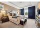 Spacious main bedroom featuring neutral tones, tray ceilings, ample natural light and luxe bedding at 702 34Th N Ave, St Petersburg, FL 33704