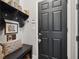 Charming entryway featuring a cozy bench, decorative accents, and practical storage, offering a welcoming first impression at 702 34Th N Ave, St Petersburg, FL 33704