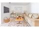 Cozy living room with stylish furnishings, a large TV, and decorative accents at 8415 Edgewater Place Blvd, Tampa, FL 33615