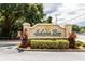 Decorative Solana Bay community entrance sign surrounded by manicured landscaping at 8568 Sandy Beach St, Tampa, FL 33634