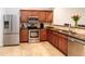 Modern kitchen with stainless steel appliances and sleek countertops at 8568 Sandy Beach St, Tampa, FL 33634