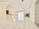 Open-concept living room featuring tile floors and a fireplace at 9191 64Th N Way, Pinellas Park, FL 33782