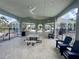 Spacious outdoor pavilion with ceiling fans and picnic tables, ideal for gatherings and events at 9520 Lemon Drop Loop, Sun City Center, FL 33573