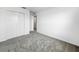 Bedroom featuring a carpeted floor and double closets at 9605 Channing Hill Dr, Sun City Center, FL 33573
