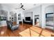 Spacious living room features hardwood floors, recessed lighting, and easy access to other rooms at 10516 Gretna Green Dr, Tampa, FL 33626