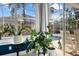 Sunroom with multiple windows and views of a screened-in pool at 10516 Gretna Green Dr, Tampa, FL 33626