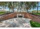 Brick and concrete pedestrian tunnel, providing a safe and convenient path underneath a road or hill at 10516 Gretna Green Dr, Tampa, FL 33626