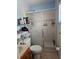 Functional bathroom with a shower and tile flooring at 10932 N 21St St, Tampa, FL 33612