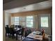 Cozy dining area with ample windows and natural light at 10932 N 21St St, Tampa, FL 33612