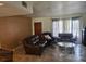Comfortable living room with tile flooring and ample natural light at 10932 N 21St St, Tampa, FL 33612
