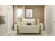 Inviting bedroom featuring neutral decor, bedside tables, soft rug, and bright natural light at 11083 E 65Th Ter, Palmetto, FL 34221