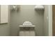 Neat laundry area offers storage shelves, a folding table, and convenient laundry organization at 11083 E 65Th Ter, Palmetto, FL 34221