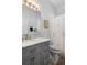 Bathroom features granite vanity, shower and tub with neutral paint and tile flooring at 1110 Jasmine Creek Ct, Sun City Center, FL 33573