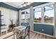 Bright breakfast nook features large windows offering scenic views, perfect for morning coffee or casual dining at 1110 Jasmine Creek Ct, Sun City Center, FL 33573