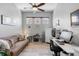 Sitting room with neutral paint, ceiling fan, and many windows for plenty of natural light at 1110 Jasmine Creek Ct, Sun City Center, FL 33573