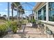 Relaxing screened patio with lush plants creating a serene space at 1110 Jasmine Creek Ct, Sun City Center, FL 33573