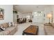 Spacious living room with dining area, bay window, and double door entry at 120 Fernbrook Rd, Oldsmar, FL 34677