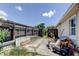Backyard with partial debris, offering potential for customization and landscaping at 1242 Bermuda St, Clearwater, FL 33755