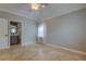 Bathroom view with vanity and mirror; door visible from bedroom view at 1242 Bermuda St, Clearwater, FL 33755