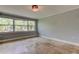 This light and airy bedroom features tile flooring and great natural light at 1242 Bermuda St, Clearwater, FL 33755