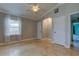 Light-filled bedroom features neutral walls, crown molding, and a ceiling fan for added comfort at 1242 Bermuda St, Clearwater, FL 33755