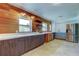 A renovated kitchen with stainless steel appliances, ample counter space and open sight lines at 1242 Bermuda St, Clearwater, FL 33755