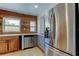 This partially renovated kitchen has stainless steel appliances and lots of counter space at 1242 Bermuda St, Clearwater, FL 33755