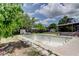 Overall shot of empty inground pool and patio area at 1242 Bermuda St, Clearwater, FL 33755