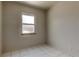 Room with window showing the window trim, wall and tile floors at 1242 Bermuda St, Clearwater, FL 33755