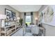 Well-lit home office featuring neutral colors, contemporary desk, and ample space for productivity at 12469 Gust Ct, Hudson, FL 34669