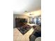 Open concept living room featuring a large sectional sofa and a view of the adjacent spaces at 13100 Serpentine Dr, Hudson, FL 34667