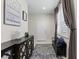 A bright and welcoming hallway with elegant decor and stylish furnishings at 1321 Custer Bayou St, Ruskin, FL 33570