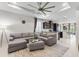 Spacious living room with an open floor plan to kitchen and cozy seating area at 1321 Custer Bayou St, Ruskin, FL 33570
