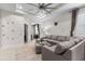 Comfortable living room featuring a stylish sectional sofa, contemporary decor and ample natural light at 1321 Custer Bayou St, Ruskin, FL 33570